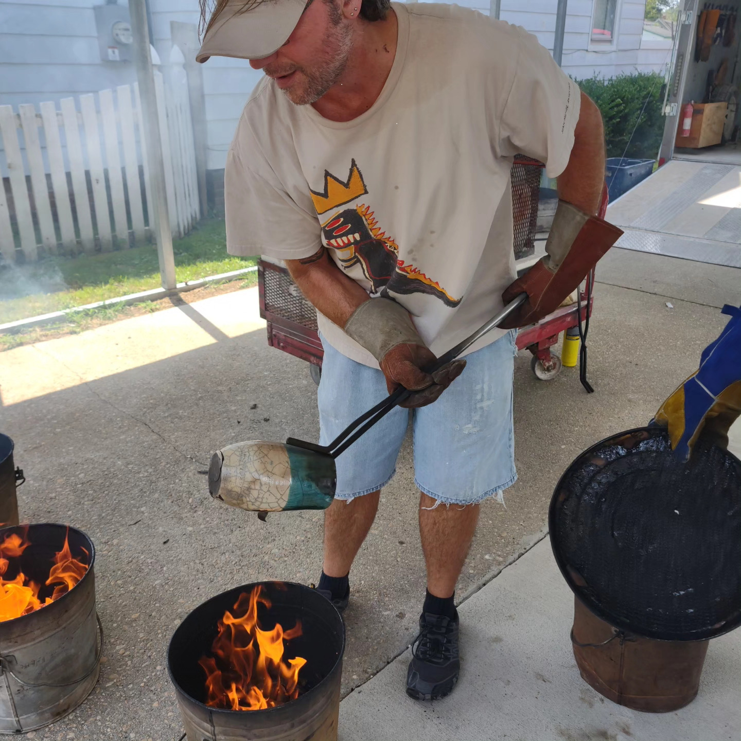 Man firing his pottery